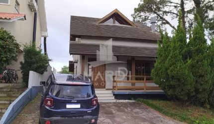 Casa em condomínio fechado com 3 quartos à venda na Avenida Edgar Pires de Castro, 540, Hípica, Porto Alegre por R$ 890.000