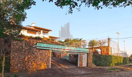 Casa com 4 quartos à venda na Rua Dona Lida Monteiro, 180, Teresópolis, Porto Alegre por R$ 1.890.000