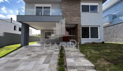 Casa em condomínio fechado com 4 quartos à venda na Estrada das Três Meninas, 1501, Vila Nova, Porto Alegre por R$ 2.150.000