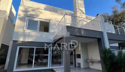 Casa em condomínio fechado com 3 quartos à venda na Rua Doutor Ney de Castilhos Ferreira, 300, Pedra Redonda, Porto Alegre por R$ 3.150.000