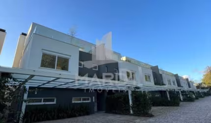 Casa em condomínio fechado com 3 quartos à venda na Rua Doutor Ney de Castilhos Ferreira, 300, Pedra Redonda, Porto Alegre por R$ 3.550.000