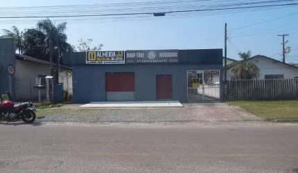 CASA COM TERRENO E SALA COMERCIAL