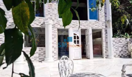 Casa em Condominio 500m² com 04 suítes, 05 vagas e piscina - Serra da Cantareira - Vende-se