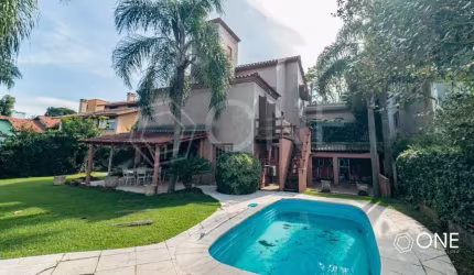 Casa em condomínio fechado com 4 quartos à venda na Avenida Firmino Octávio Bimbi, 255, Cavalhada, Porto Alegre por R$ 2.190.000