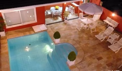 Casa em condomínio fechado com 5 quartos à venda na Avenida General Barreto Viana, 430, Chácara das Pedras, Porto Alegre por R$ 1.550.000