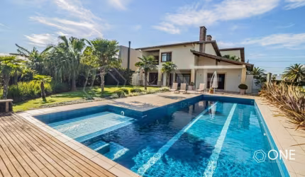 Casa em condomínio fechado com 5 quartos à venda na Avenida Juca Batista, 8000, Belém Novo, Porto Alegre por R$ 3.900.000