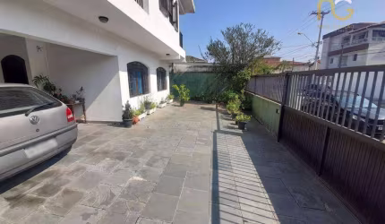 Casa com 4 dormitórios à venda, 250 m² por R$ 1.960.000,00 - Boqueirão - Praia Grande/SP