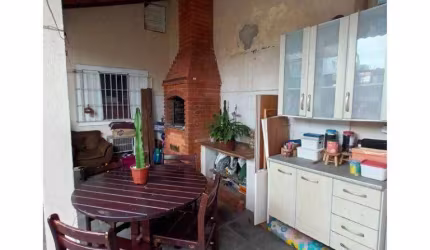 Casa com 3 dormitórios à venda, 212 m² por R$ 689.000,00 - Vila Guilhermina - Praia Grande/SP