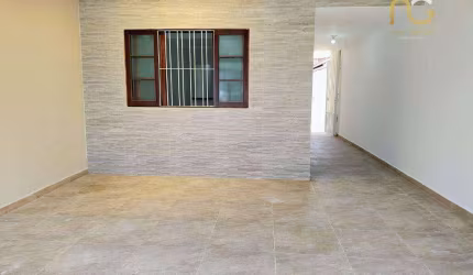 Casa com 2 dormitórios à venda, 100 m² por R$ 450.000,00 - Caiçara - Praia Grande/SP