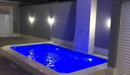 Sobrado com 3 dormitórios à venda, 151 m² por R$ 1.160.000,00 - Tupi - Praia Grande/SP
