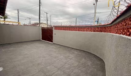 Casa com 2 dormitórios à venda por R$ 410.000,00 - Caiçara - Praia Grande/SP