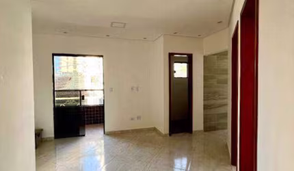 Casa com 2 dormitórios à venda por R$ 330.000,00 - Caiçara - Praia Grande/SP