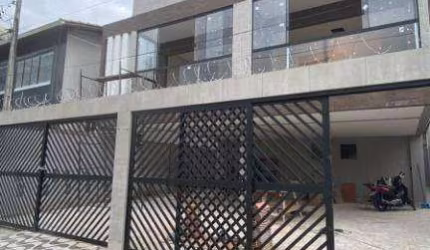 Casa com 3 dormitórios à venda, 91 m² por R$ 550.000,00 - Vila Guilhermina - Praia Grande/SP