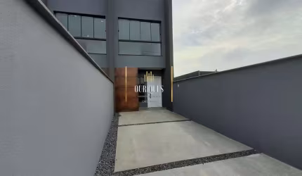 Geminado com 2 suites e 2 vagas de garagem