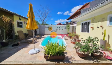 Casa com 3 dormitórios à venda, 157 m² por R$ 690.000,00 - Caxito - Maricá/RJ