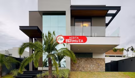Condomínio Alphaville: Sobrado novo moderno à venda 5 suítes, sauna, armários. Aceita permuta