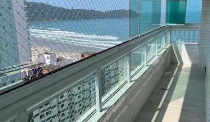 PORTEIRA FECHADA E VISTA MAR! Apartamento com 3 dormitórios à venda, 140 m² por R$ 1.580.000 - Vila Guilhermina - Praia Grande/SP