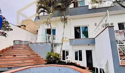 Casa com 3 dormitórios à venda, 405 m² por R$ 1.490.000,00 - Loteamento Caminhos de San Conrado (Sousas) - Campinas/SP