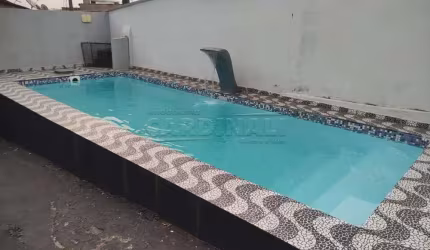 1 dormitório  1sala 1 cozinha 1 banheiro  1 lavanderia  1 piscina  1 área de churrasco