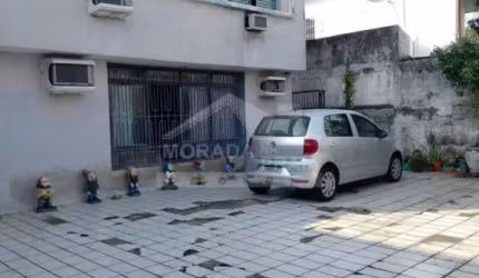 Sobrado no Boqueirão, 4 dormitórios, edícula, confira na imobiliária em Praia Grande.