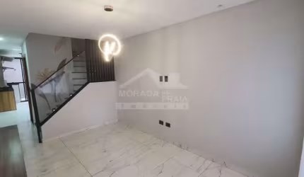 Sobrado com acabamento fino no Caicara, 2 dormitórios, confira em Praia Grande.