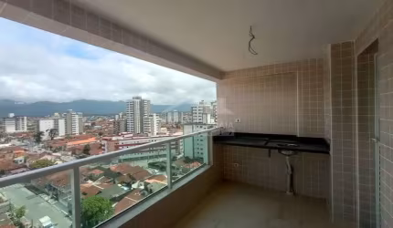 Apartamento frente mar de 2 dormitórios, sacada, confira em Praia Grande.
