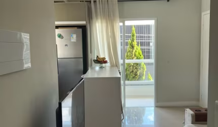 Apartamento a venda com 2 quartos sendo 1 suíte, 2 banheiros e 2 vagas de garagem.