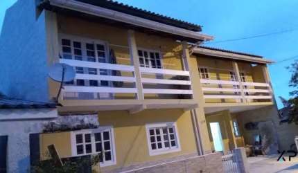 Imóvel para investimento com 2 quartos, 1 banheiro e 1 vaga de garagem.