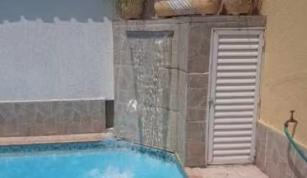 Casa com 4 dormitórios, 5 vaga (s) na Praia Grande