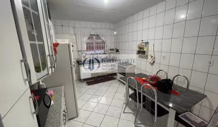 Casa Terrea com 2 dormitorios 1 suite 1 vaga coberta Vila Buenos Aires.