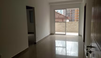 Pompéia Locação excelente apartamento 2 dormitórios poucos metros do mar!!!