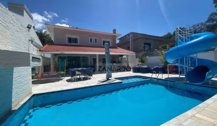 Casa com 7 dormitórios à venda, 491 m² por R$ 10.800.000,40 - Riviera de São Lourenço - Bertioga/SP