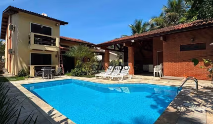 Casa 5 dormitórios, 330 m² - venda por R$ 3.200.000 ou aluguel por R$ 12.000/mês - Riviera de São Lourenço - Bertioga/SP