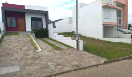 Casa com 3 quartos à venda na SETE MIL E DUZENTOS, 87, Hípica, Porto Alegre por R$ 599.000