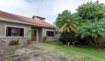 Casa com 3 quartos à venda na Rua Jayme Saul de Borba, 40, Guarujá, Porto Alegre por R$ 650.000