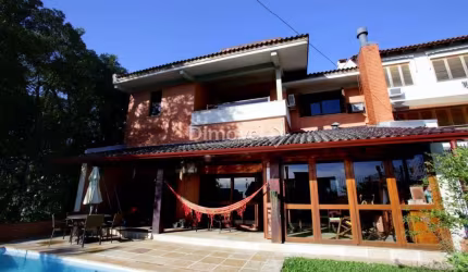 Casa com 4 quartos à venda na Rua Alcebíades Antônio dos Santos, 157, Nonoai, Porto Alegre por R$ 1.650.000