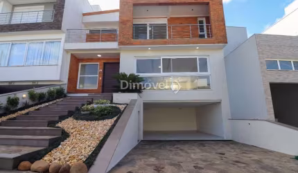 Casa em condomínio fechado com 3 quartos à venda na Rua Francisco Solano Borges, 200, Hípica, Porto Alegre por R$ 1.290.000