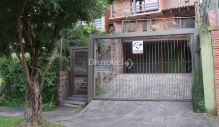 Casa com 3 quartos à venda na Rua Edgar Luiz Schneider, 490, Jardim Isabel, Porto Alegre por R$ 1.290.000