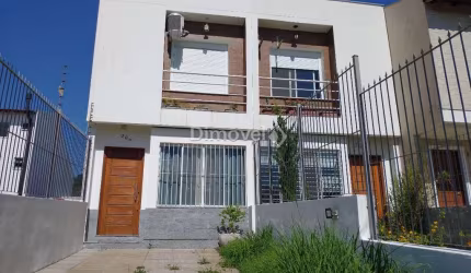 Casa com 2 quartos à venda na Rua Ilari Arlindo Basei, 204, Guarujá, Porto Alegre por R$ 420.000