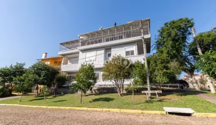 Casa em condomínio fechado com 4 quartos à venda na Rua Doutor Campos Velho, 1245, Cristal, Porto Alegre por R$ 1.300.000