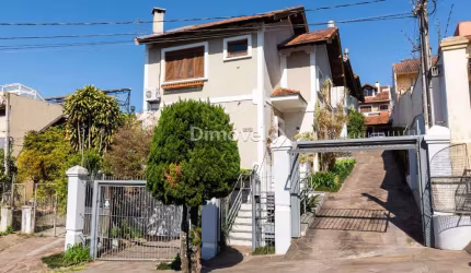 Casa em condomínio fechado com 3 quartos à venda na Rua Padre João Batista Reus, 2083, Tristeza, Porto Alegre por R$ 680.000