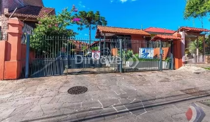 Casa em condomínio fechado com 3 quartos à venda na Rua Sílvio Silveira Soares, 2406, Camaquã, Porto Alegre por R$ 375.000