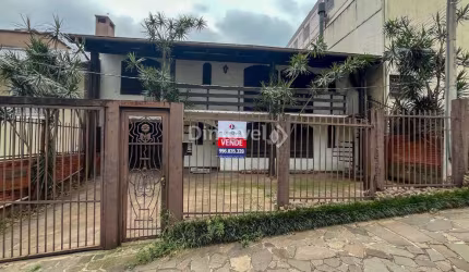Casa com 5 quartos à venda na Rua Doutor Mário Totta, 1170, Tristeza, Porto Alegre por R$ 790.000