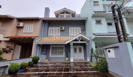 Casa em condomínio fechado com 3 quartos à venda na Rua Corticeira, 431, Hípica, Porto Alegre por R$ 699.000