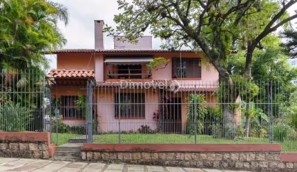Casa com 6 quartos à venda na Rua Itapitocaí, 725, Cristal, Porto Alegre por R$ 1.590.000