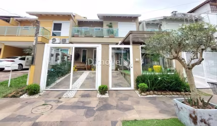 Casa em condomínio fechado com 3 quartos à venda na Rua Guatambu, 389, Hípica, Porto Alegre por R$ 799.000