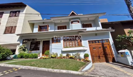 Casa em condomínio fechado com 4 quartos à venda na Avenida Vicente Monteggia, 2000, Cavalhada, Porto Alegre por R$ 1.487.000