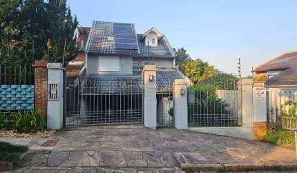 Casa com 3 quartos à venda na Rua General Tadeusz Kosciuszko, 52, Jardim Isabel, Porto Alegre por R$ 950.000