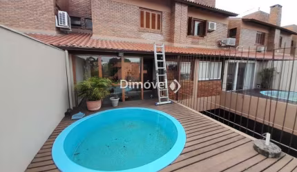 Casa em condomínio fechado com 3 quartos à venda na Rua Doutor David de Azevedo Gusmão, 185, Jardim Isabel, Porto Alegre por R$ 1.060.000