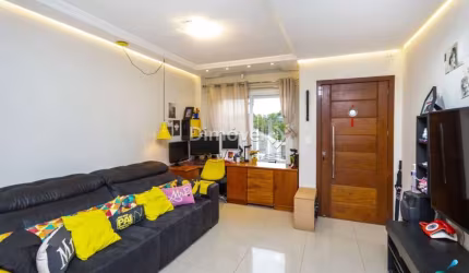 Casa com 2 quartos à venda na Rua Doutor Sérgio de Figueiredo, 250, Guarujá, Porto Alegre por R$ 400.000